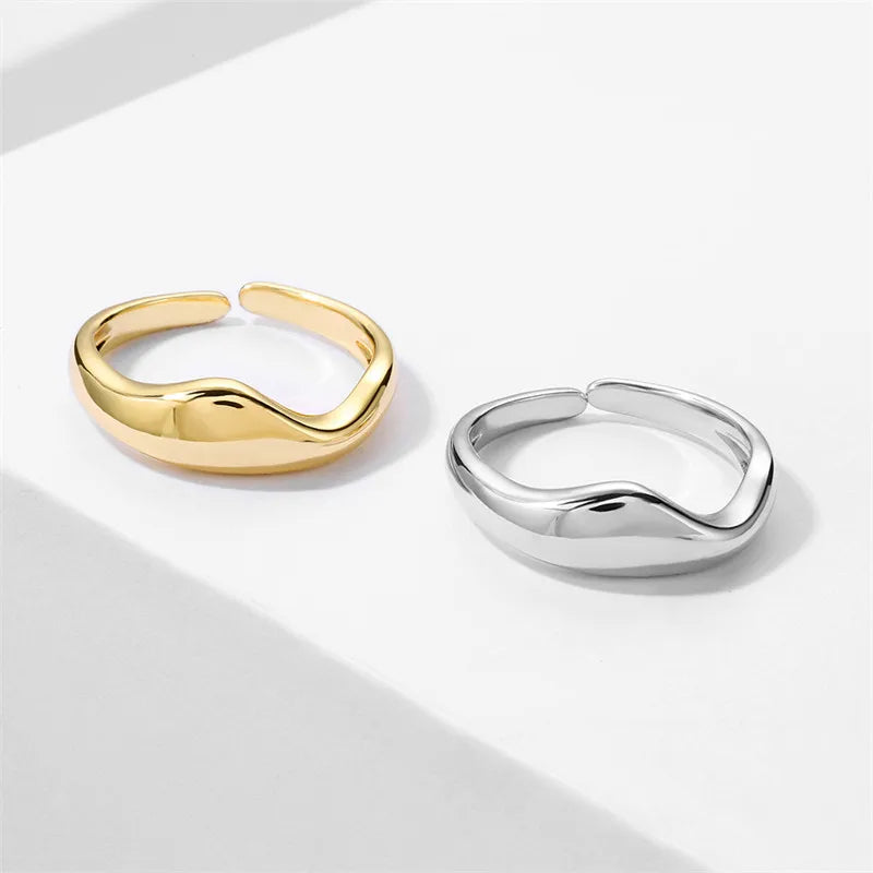 Gold & Silver Irregular Wave Rings with Simple Geometric Design