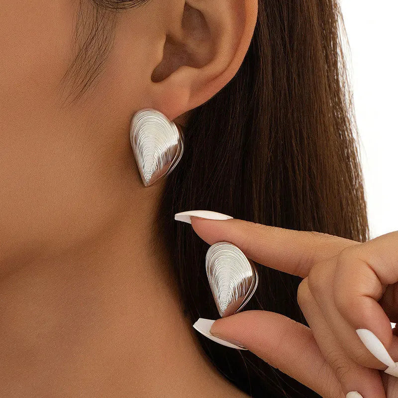 Vintage Metal Shell Stud Earrings with Silver Texture & Geometric Irregular Design