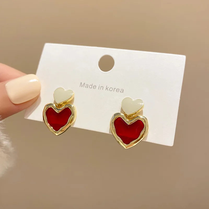 Shining Rhinestone Hollow Heart Drop Earrings with Vintage Red Crystals