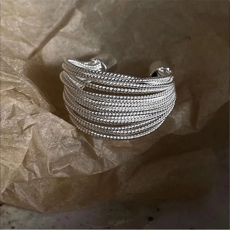 Gold & Silver Irregular Wave Rings with Simple Geometric Design