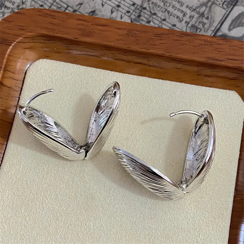 Vintage Metal Shell Stud Earrings with Silver Texture & Geometric Irregular Design