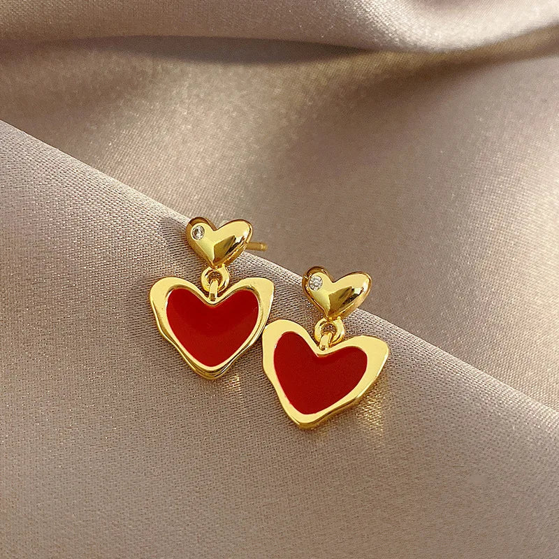 Shining Rhinestone Hollow Heart Drop Earrings with Vintage Red Crystals