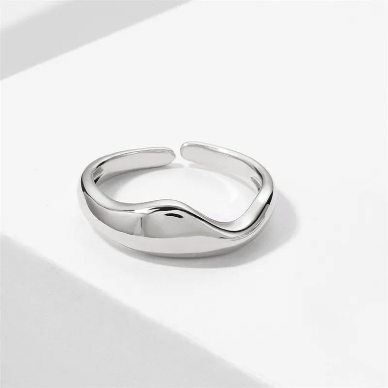 Gold & Silver Irregular Wave Rings with Simple Geometric Design