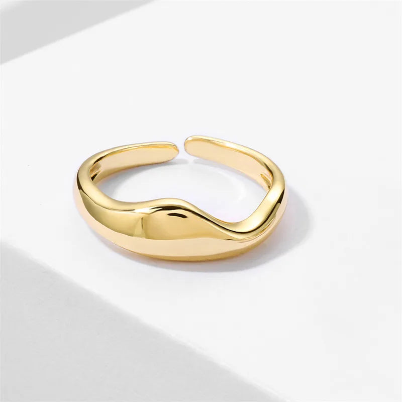 Gold & Silver Irregular Wave Rings with Simple Geometric Design